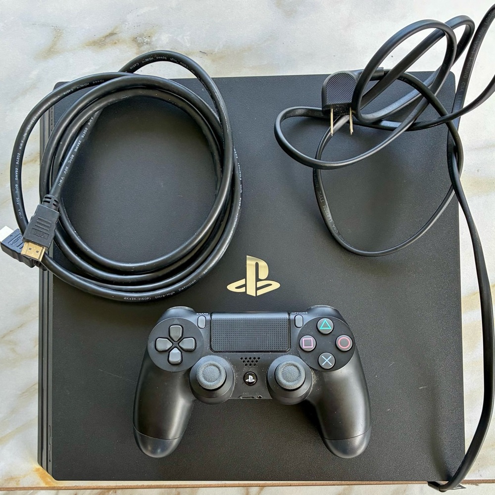 Sony PlayStation 4 Pro 1TB Sleek Black model CUH 7215B